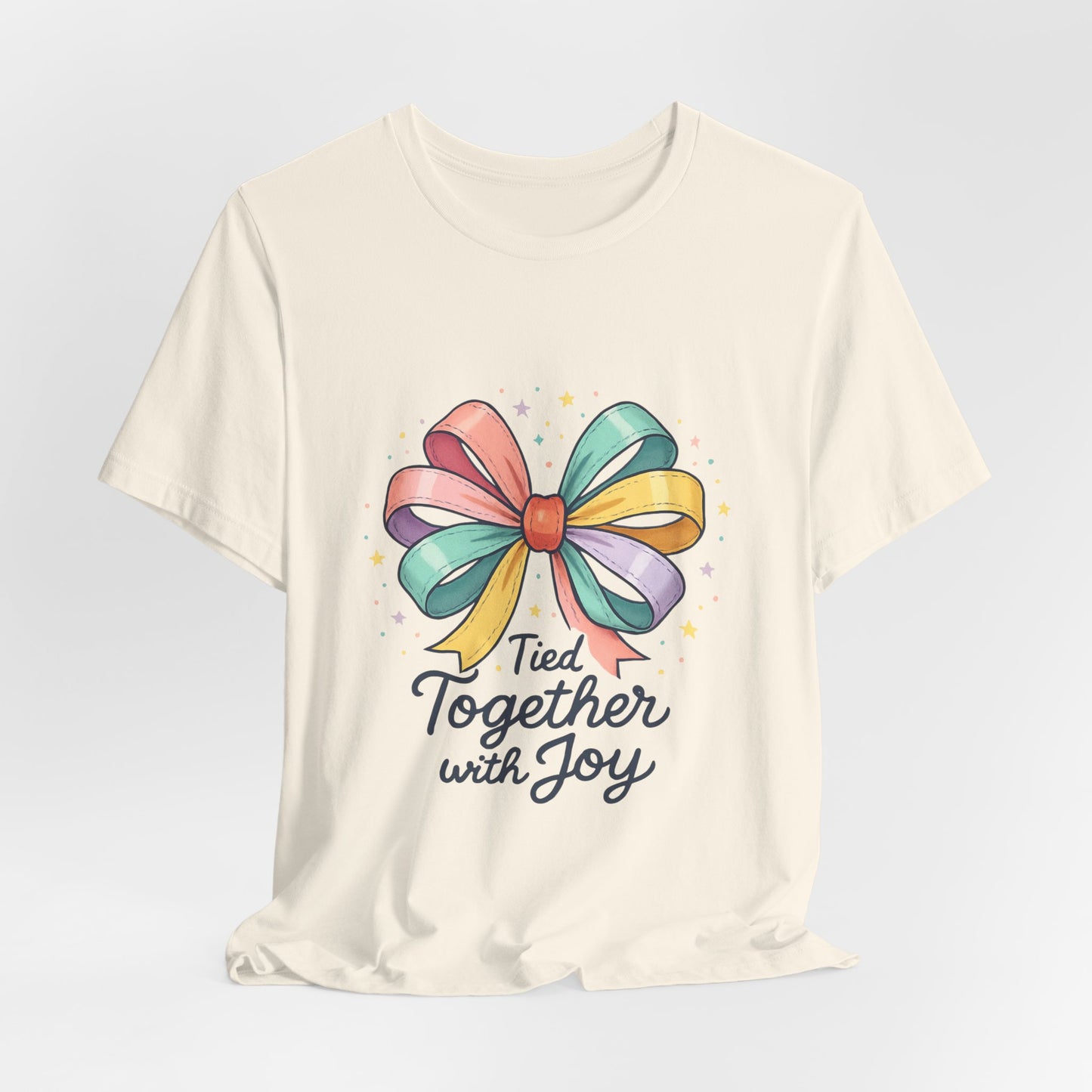 T-Shirt — "Tied Together With Joy" Rainbow Bow Graphic Tee